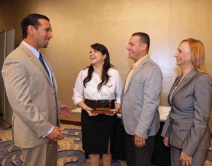 From left: Joey Cancel, second vice of the government guaranteed loans unit; Carmen Ríos and  Carlos Rivera, Dulzura Borincana owners, and Elsie Nieves, official of FirstBank’s government guaranteed loans unit, after the ceremony.