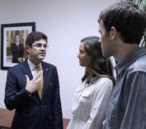 P.R. Trade Executive Director Francisco Chévere and AIESEC members talk following the signing of the agreement Thursday.