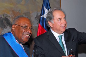 Gérard Latortue, former prime minister of Haiti, receives the "Orden de Merito" award from Juan Gabriel Valdés, Chile's ambassador to the United States, at a Nov. 6 reception in Washington. (Credit: Larry Luxner)