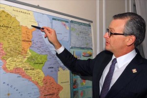 Manuel Antonio González Sanz, foreign minister of Costa Rica, points to his country’s disputed border with Nicaragua, which is building a $50 billion transoceanic canal with Chinese financing. (Credit: Larry Luxner)