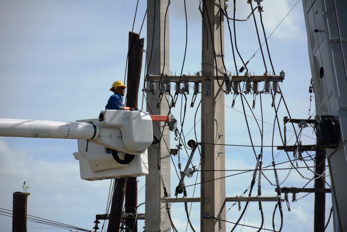 A lineworker services electrical infrastructure in Puerto Rico in the aftermath of Hurricane Maria. (File photo/Credit: Fluor)