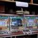 Gaming machines operate outside government-licensed hotel casinos in Puerto Rico. (Credit: © Mauricio Pascual)