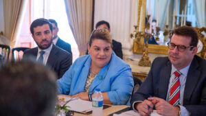 From left: Sebastián Negrón-Reichard, Gov. Jenniffer González and Chief of Staff Francisco Domenech at the signing.