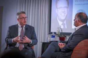 New York Fed President John C. Williams speaks with Mike Soto-Class, CEO of the Center for a New Economy, during a moderated discussion.