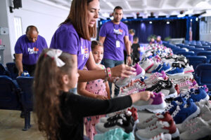 The organizations delivered 330 new pairs of shoes to children at Jesús María Sanromá Public School in Carolina.