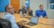 Officials from Bayer Crop Science Puerto Rico and the Office for Socioeconomic and Community Development (ODSEC, in Spanish) meet to renew their partnership agreement.