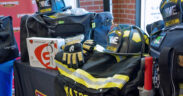 The donation includes 10 full sets of bunker gear, each with a helmet, gloves, boots, pants, jacket and flashlight with carrying bag.