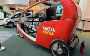 Cooperativa de Seguros Múltiples’ Eco Taxi initiative on display at the exhibit.