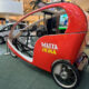 Cooperativa de Seguros Múltiples’ Eco Taxi initiative on display at the exhibit.