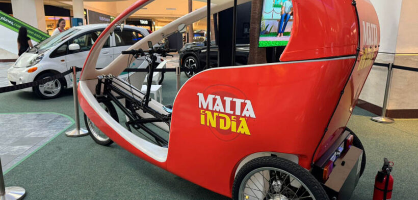 Cooperativa de Seguros Múltiples’ Eco Taxi initiative on display at the exhibit.