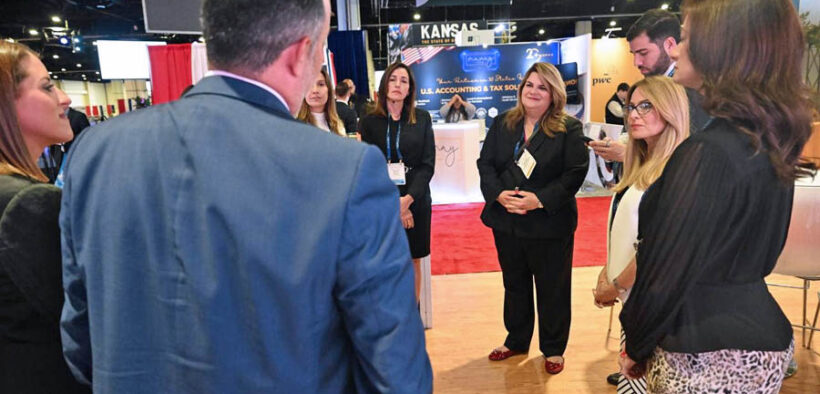 Officials from the administration of Puerto Rico Gov. Jenniffer González (center), including Economic Development Secretary Sebastián Negrón (to her right) and InvestPR CEO Ella Woger-Nieves (second from right), present the island’s nearshoring advantages to investors at the SelectUSA Investment Summit.