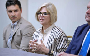 Alexandra Fernández-Navarro (center), board member of FirstNet, provides details about the new operation in Puerto Rico.