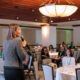 Brenda Irizarry of FirstBank leads a coaching habits training during a recent 1Éxito for Business event.