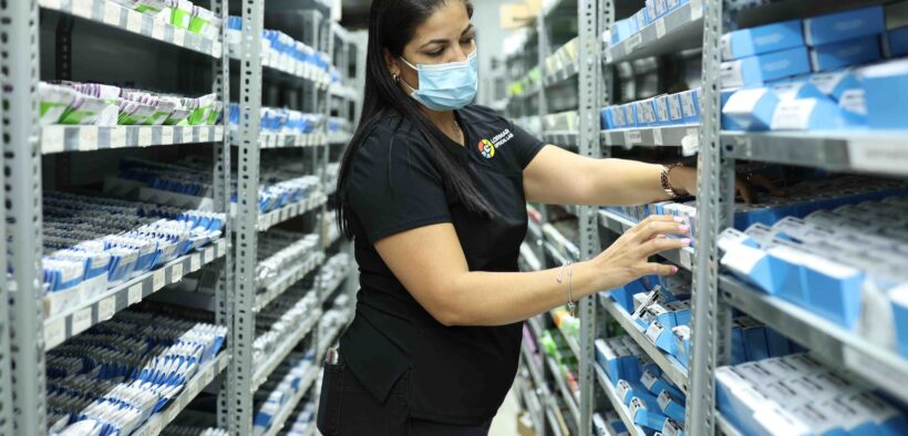 A Lormar Optical employee works at the company’s new facility in Cayey, Puerto Rico.