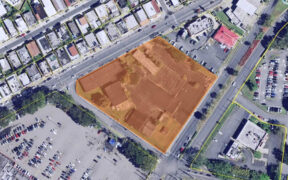 The property spans approximately three acres and includes two buildings totaling more than 24,000 square feet — one measuring 17,441 square feet and the other, a former maintenance garage, at 7,312 square feet. (Credit: GSA)