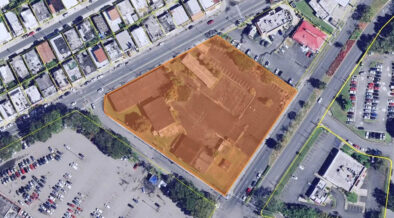 The property spans approximately three acres and includes two buildings totaling more than 24,000 square feet — one measuring 17,441 square feet and the other, a former maintenance garage, at 7,312 square feet. (Credit: GSA)