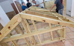 The course combined classroom instruction and hands-on training in carpentry, masonry, gypsum board installation, plumbing and electrical work.