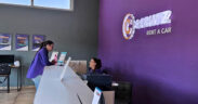 Staff assist customers at the new Carwiz Rent a Car location on Isla Verde Avenue in Carolina. (Credit: Carwiz Rent a Car's Facebook page.)