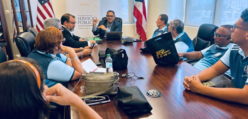 NET officials meet with licensed amateur radio operators to sign the new collaboration agreement expanding Puerto Rico’s Amateur Radio Bank.
