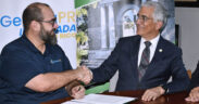 Genera PR Community Relations Manager Jorge Bracero and UPR-Mayagüez Chancellor Agustín Rullán-Toro during the signing ceremony of the academic collaboration agreement.