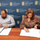 From left: Education Secretary Eliezer Ramos-Parés and One Stop Career Center Executive Director Carmen Cosme-Pitre at the signing of a renewed agreement to support aviation industry training in Puerto Rico.