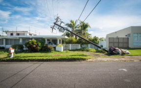 A downed utility pole in Puerto Rico highlights the importance of efficient disaster reporting systems such as the FCC’s DIRS, which help prioritize recovery efforts during major emergencies. (Credit: Sararmas | Dreamstime.com)
