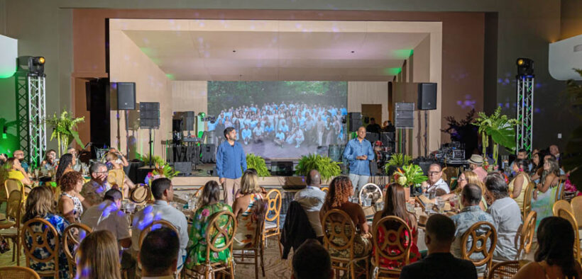 Integra Design Group founding partners Richard Cuebas and Carlos Báez speak during the firm’s 25th anniversary celebration.