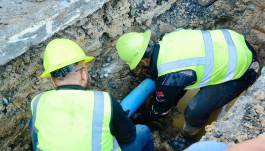 Workers carry out repairs on a water line in a photo provided by the Puerto Rico Aqueduct and Sewer Authority (PRASA) as part of an update on the gradual restoration of potable water service for customers of the Sergio Cuevas plant.