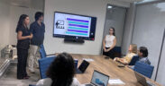 WeServe Fellows present strategic recommendations to nonprofit leaders during the final session of their summer internship with the V2A Foundation.