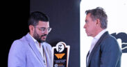 Orlando Bravo, right, co-founder of the Bravo Family Foundation, presents the All-Around Performance Award to Obeth Seguinot of Mikokos during REP Day 2025.