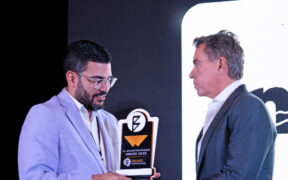 Orlando Bravo, right, co-founder of the Bravo Family Foundation, presents the All-Around Performance Award to Obeth Seguinot of Mikokos during REP Day 2025.