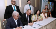 Seated from left: José Rodríguez, medical director of Hospital General de Castañer; Giovanni Ortiz, the hospital’s CEO; and EDP University President Gladys Nieves.