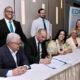 Seated from left: José Rodríguez, medical director of Hospital General de Castañer; Giovanni Ortiz, the hospital’s CEO; and EDP University President Gladys Nieves.