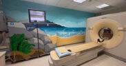 A coastal-themed mural with blue tones, rocks and plants was painted in the Imaging Center at Puerto Rico Children’s Hospital in Bayamón to create a calming environment for pediatric patients.