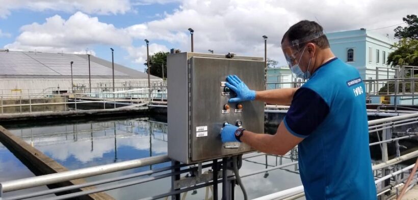 An employee operates equipment at the Los Filtros water plant in Guaynabo, a facility Gov. Jenniffer González says must be replaced as part of a $10 million emergency plan to address water service outages. (Credit: Puerto Rico Aqueduct & Sewer Authority)