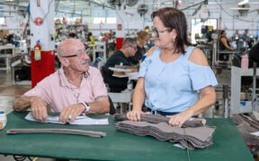 Brightforce employees work on uniform and equipment production at the company’s Mayagüez plant.
