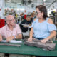 Brightforce employees work on uniform and equipment production at the company’s Mayagüez plant.
