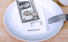 Waiters, bartenders and other tipped employees on the island will not see the same relief being discussed in Washington unless lawmakers amend the island’s tax code. (Credit: Sheila Fitzgerald | Dreamstime.com)