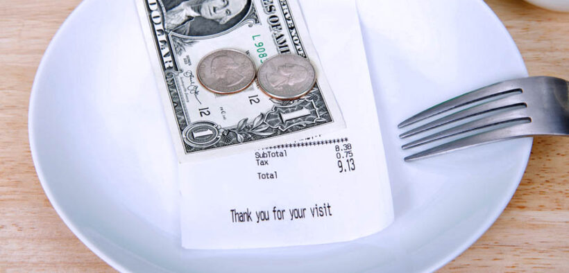 Waiters, bartenders and other tipped employees on the island will not see the same relief being discussed in Washington unless lawmakers amend the island’s tax code. (Credit: Sheila Fitzgerald | Dreamstime.com)