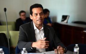 Raúl Márquez-Hernández, former Puerto Rico secretary of state and current legislative adviser for the Puerto Rico Tourism Co., testifies before the House Tourism Committee on room tax proposals.