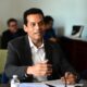 Raúl Márquez-Hernández, former Puerto Rico secretary of state and current legislative adviser for the Puerto Rico Tourism Co., testifies before the House Tourism Committee on room tax proposals.