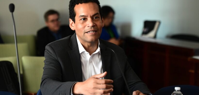 Raúl Márquez-Hernández, former Puerto Rico secretary of state and current legislative adviser for the Puerto Rico Tourism Co., testifies before the House Tourism Committee on room tax proposals.