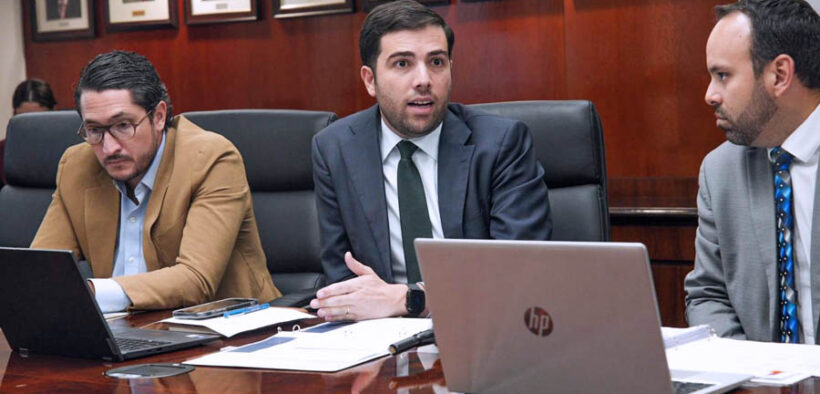 From left: Luis B. Méndez del Nido, general counsel of the Puerto Rico Department of Economic Development and Commerce’s Office of Legal Counsel and Legislative Affairs; agency Secretary Sebastián Negrón; and Ernesto J. Zayas-García, director of the department’s Business Incentives Office, during a press briefing on Act 60 oversight measures in San Juan.