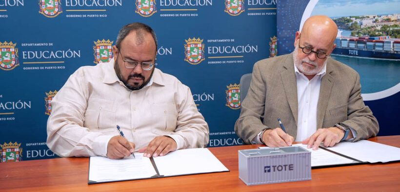 Puerto Rico Education Secretary Eliezer Ramos-Parés and Eduardo Pagán, TOTE’s vice president of corporate affairs, sign an agreement to expand maritime career opportunities for students.