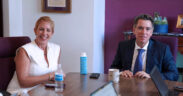 From left, Bravo Family Foundation CEO Blanca Santos and Puerto Rican investor and philanthropist Orlando Bravo speak with members of the island’s press.
