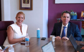 From left, Bravo Family Foundation CEO Blanca Santos and Puerto Rican investor and philanthropist Orlando Bravo speak with members of the island’s press.