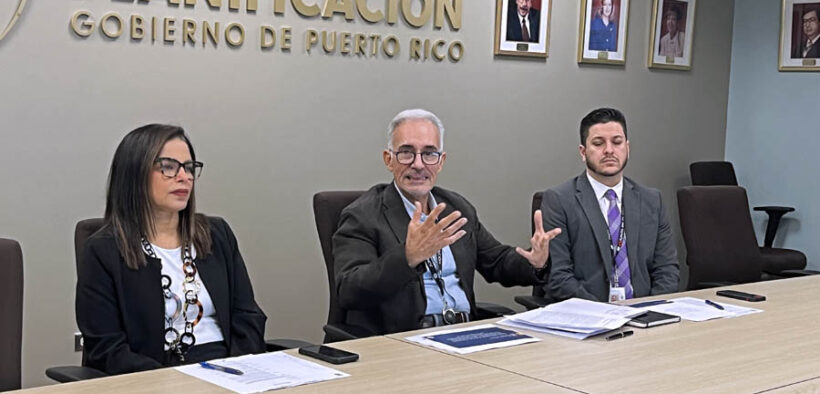 Puerto Rico Planning Board President Héctor Morales-Martínez, center, announces the start of the review process for the island’s Land Use Plan.