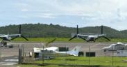Two U.S. military Osprey tiltrotor aircraft are seen parked at José Aponte de la Torre Airport, on the grounds of the former Roosevelt Roads Naval Station in Ceiba. The aircraft are part of recent Pentagon operations in Puerto Rico linked to counter-drug and regional defense activities. (Credit: News is my Business)