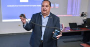 Wilfredo Pereira, FirstNet Caribbean Territories manager, demonstrates FirstNet’s Mission Critical Push-to-Talk technology.