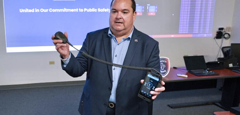 Wilfredo Pereira, FirstNet Caribbean Territories manager, demonstrates FirstNet’s Mission Critical Push-to-Talk technology.